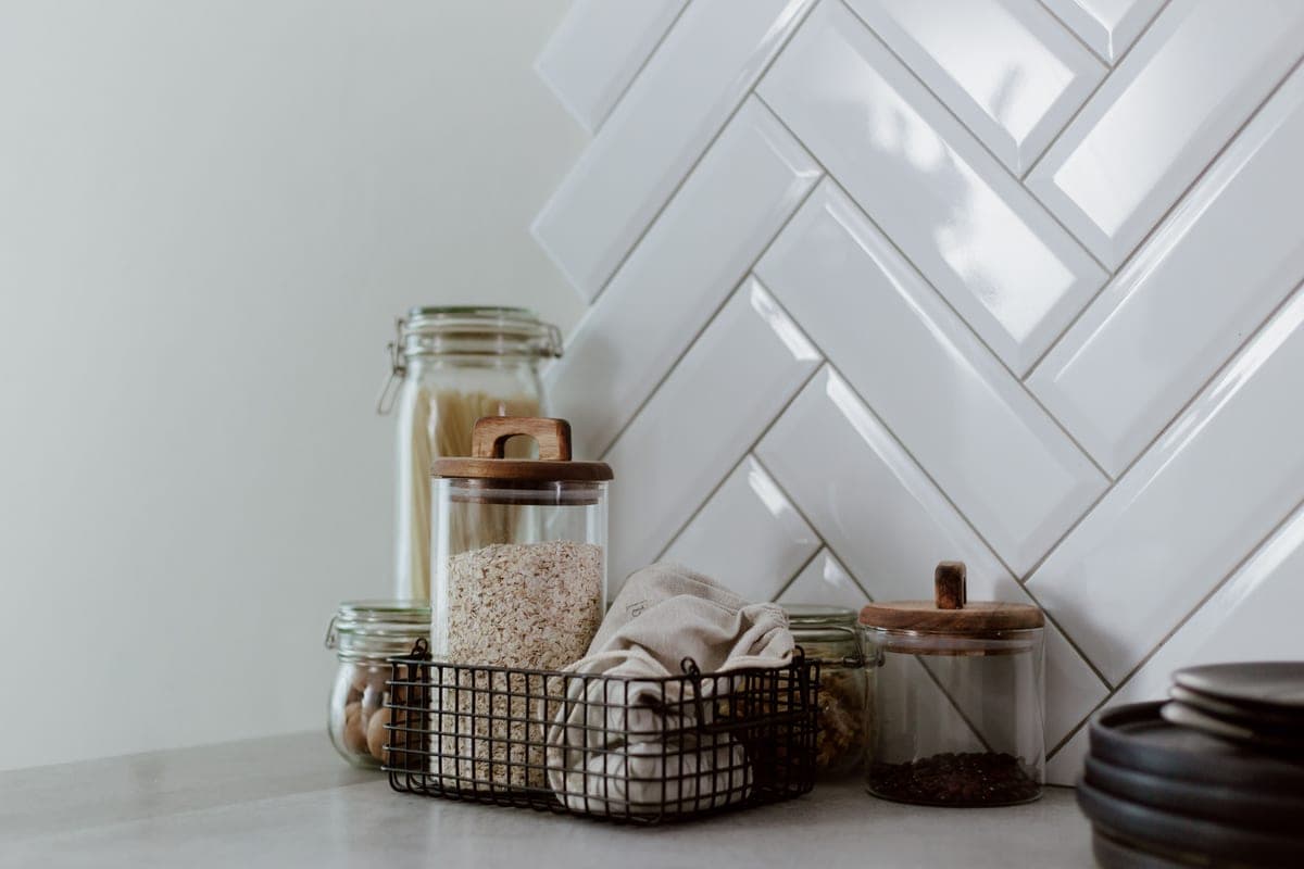 Glass storage jars on a kitchen counter